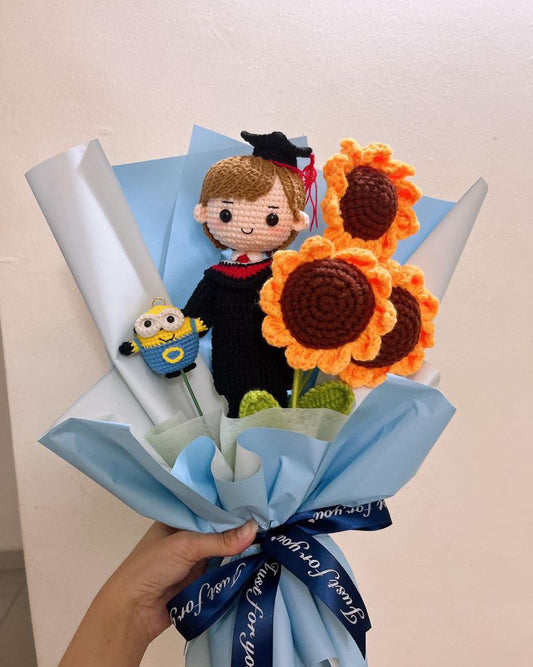 Graduation Doll With 3 Sunflowers And Banana